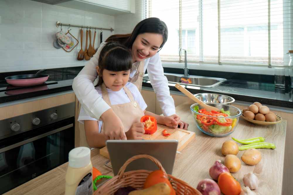 Mother is teaching her daughter how to cook (illustration)